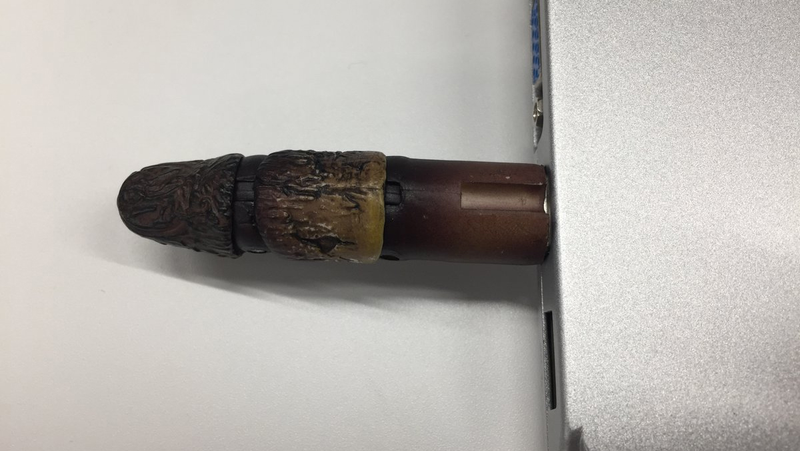 Illustration for article titled Resident Evil 7 USB Doll Finger Looks Like A Burnt Penis